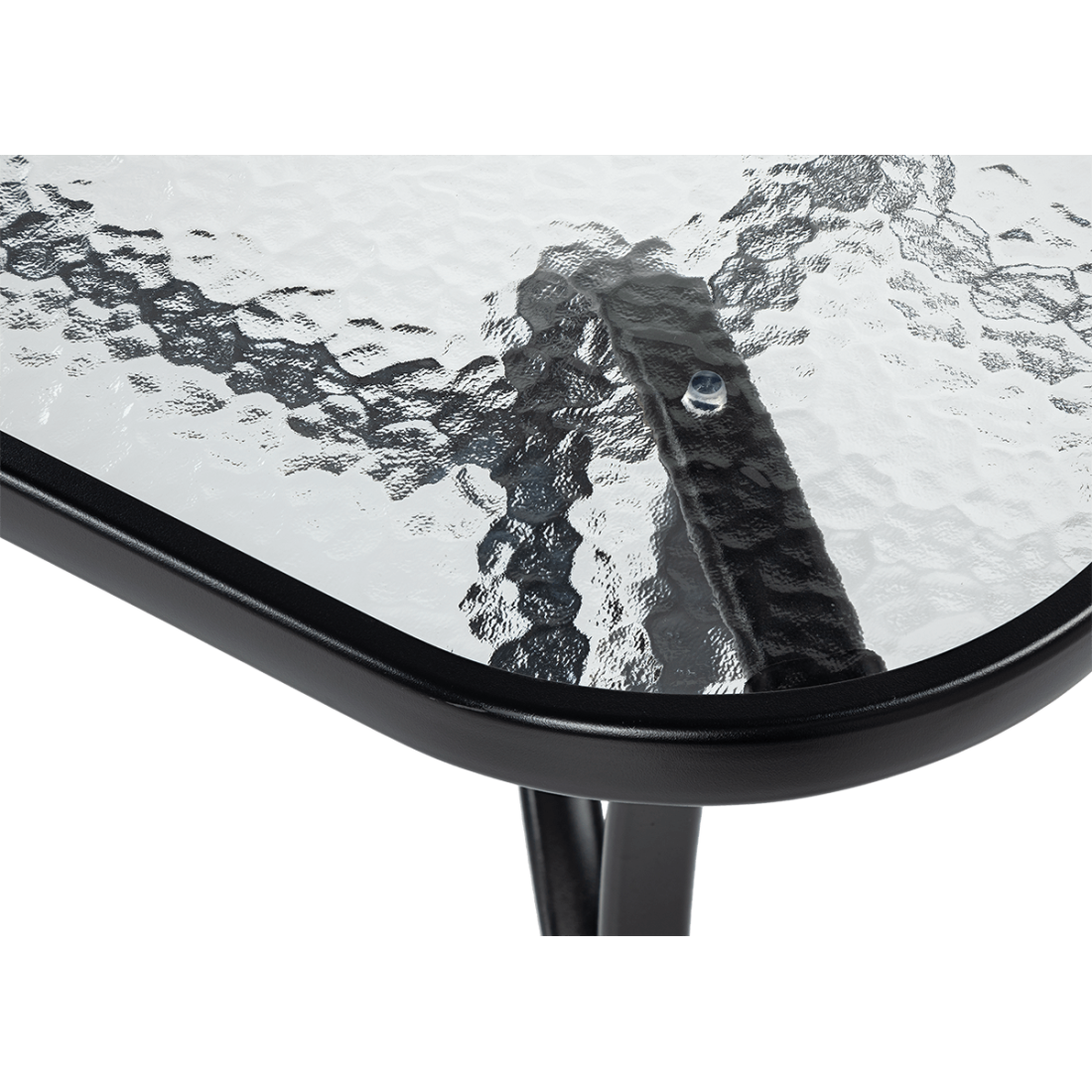 zbliżenie na szybę hartowaną stołu jadalnianego 