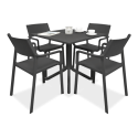 meble jadalniane ogrodowe z czterema czarnymi krzesłami i czarnym stołem