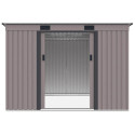 Widok na wnętrze domku narzędziowego OREGON 261x241cm Warm Grey przez otwarte drzwi