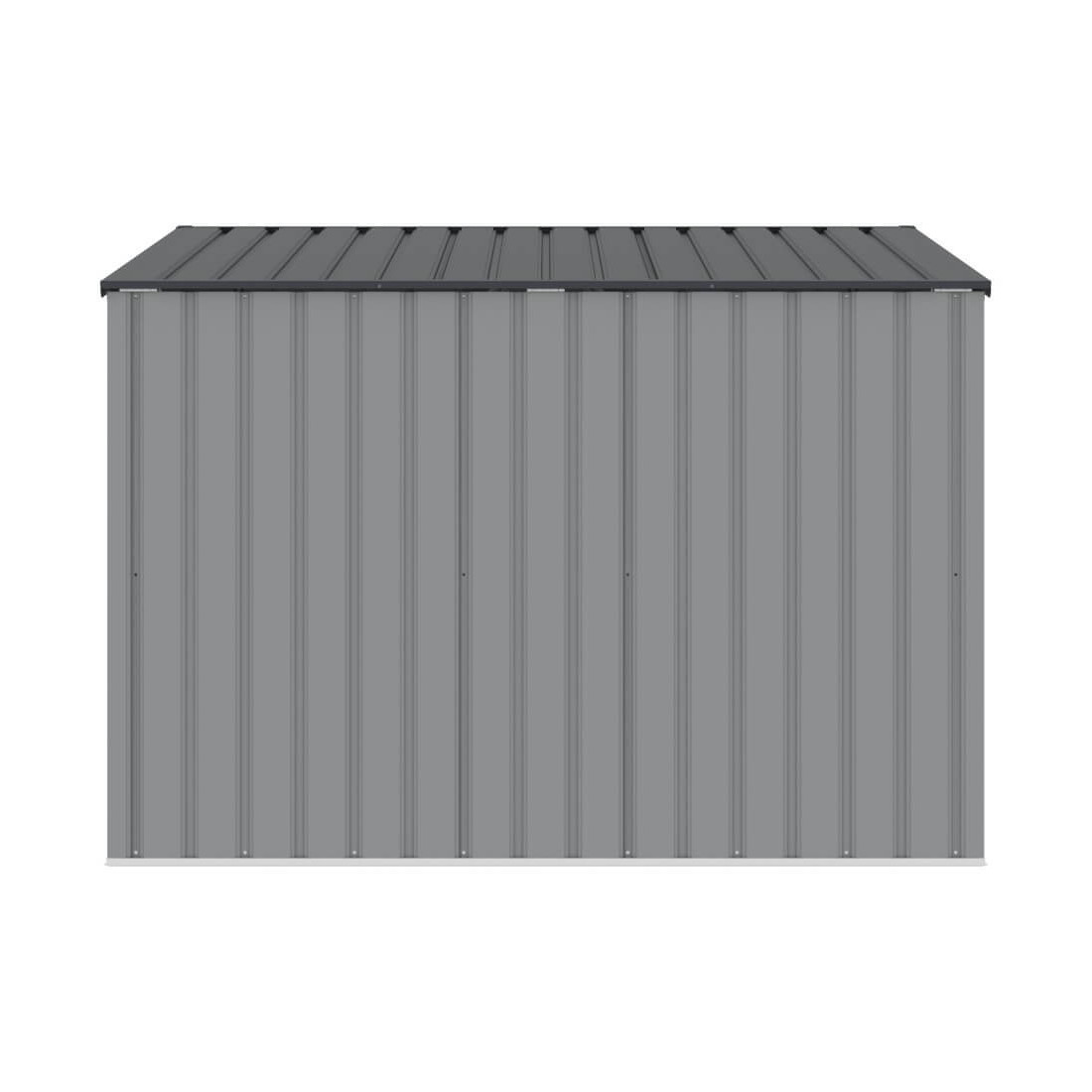 Tył jasnoszarej zabudowy do koszy na śmieci