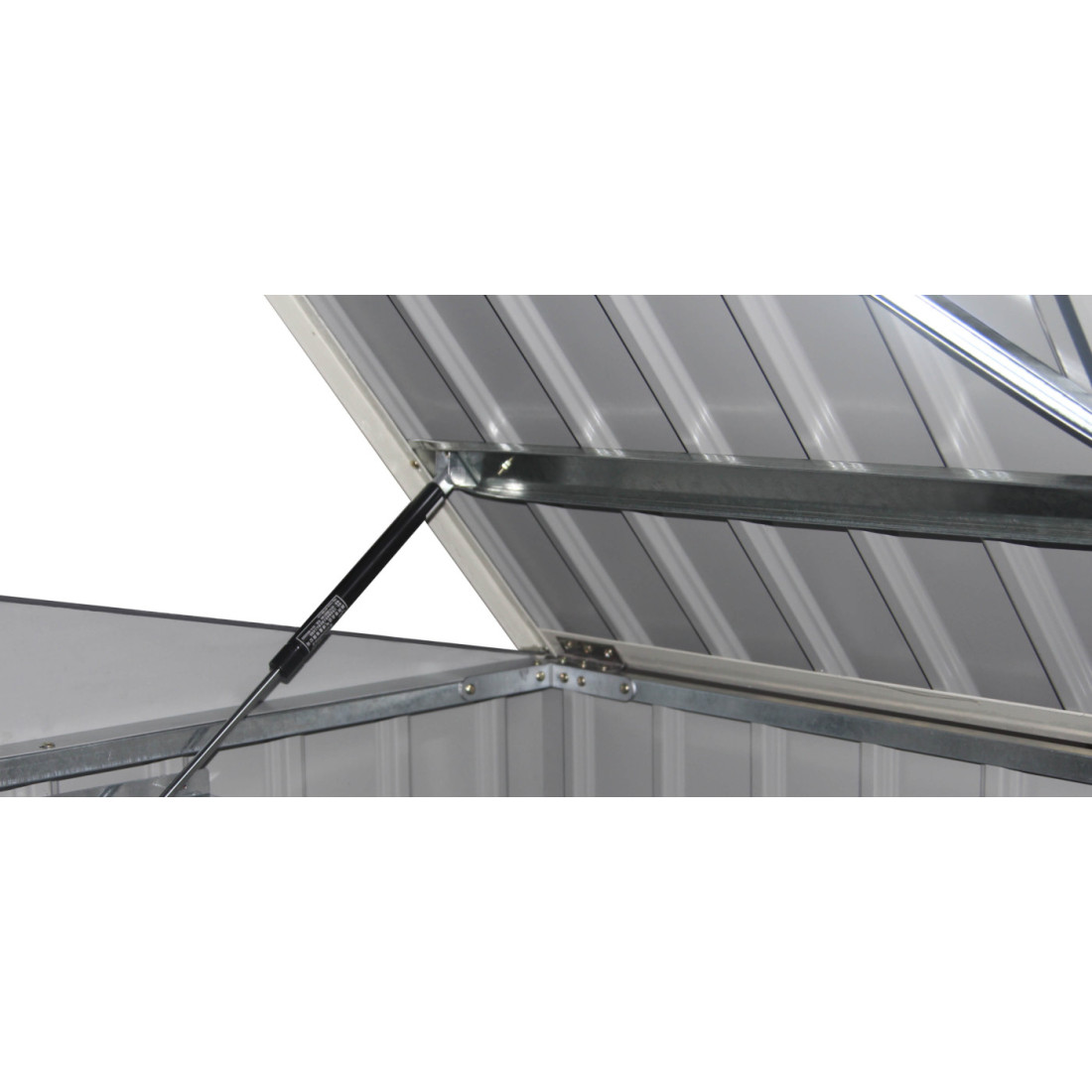 Widok na dwie pneumatyczne sprężyny ułatwiające otwieranie i bezpiecznie utrzymujące pokrywę bez użycia rąk