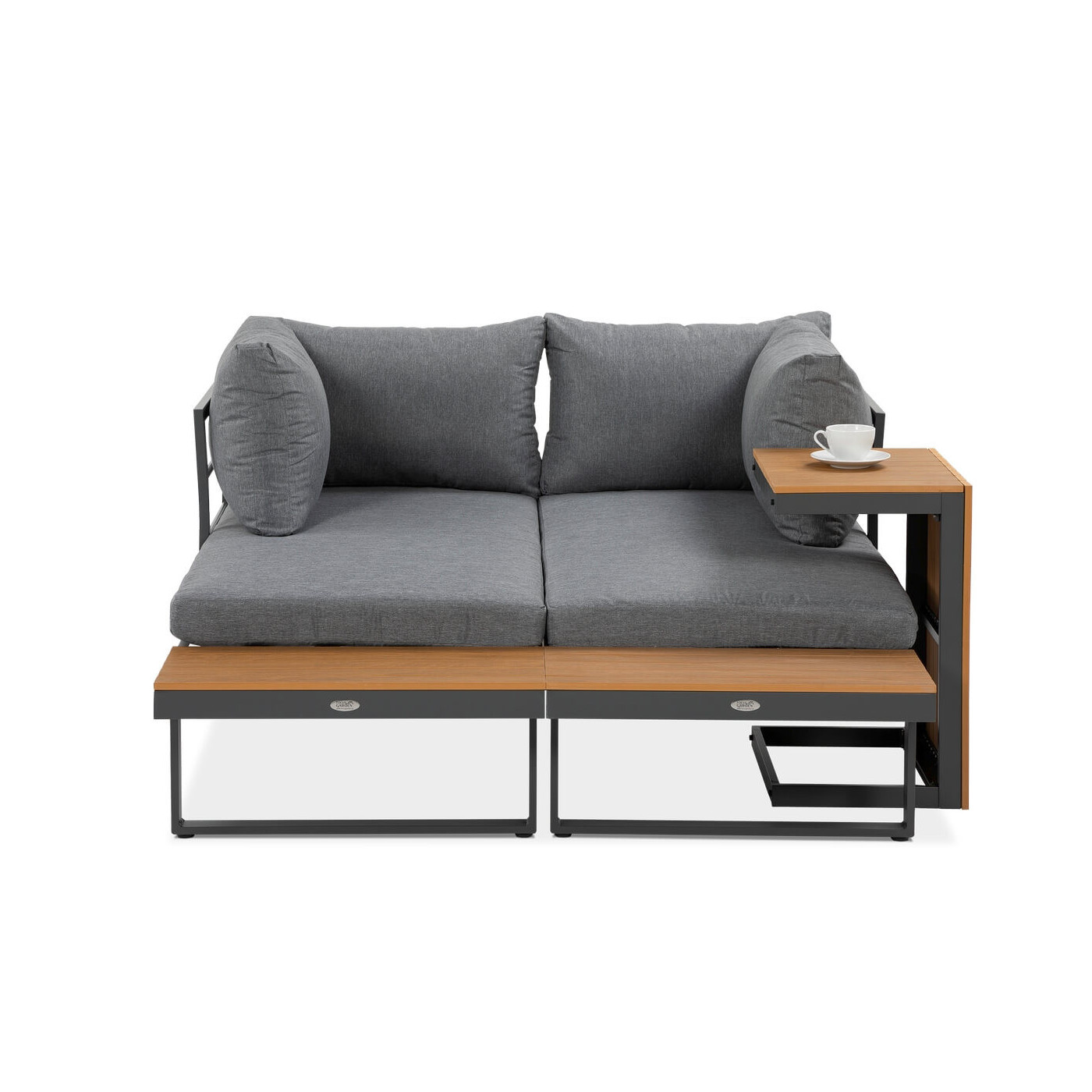 Narożnik modułowy tulip skonfigurowany jako jedna duża kanapa z wysokim stolikiem kawowym obok