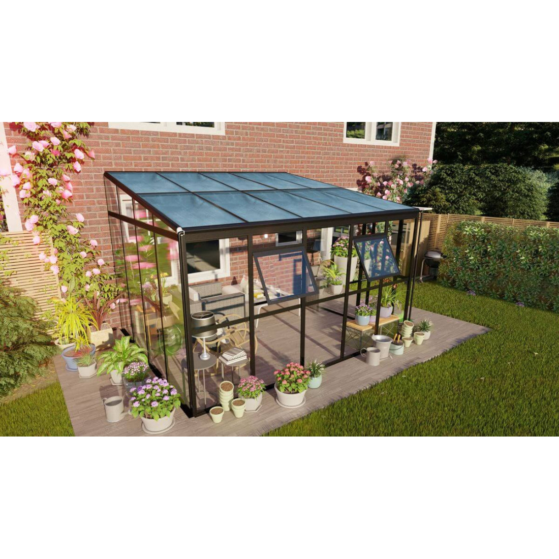 Ogród zimowy SOHO Black 364x290cm PC + Glass - Gutroof aranżacja przy domu wśród roślin i kwiatów, szklana konstrukcja