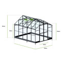Solid PC 347x278cm black polycarbonate greenhouse in a garden arrangement