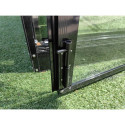 Garden with a black Solid PC polycarbonate greenhouse from Cultivo
