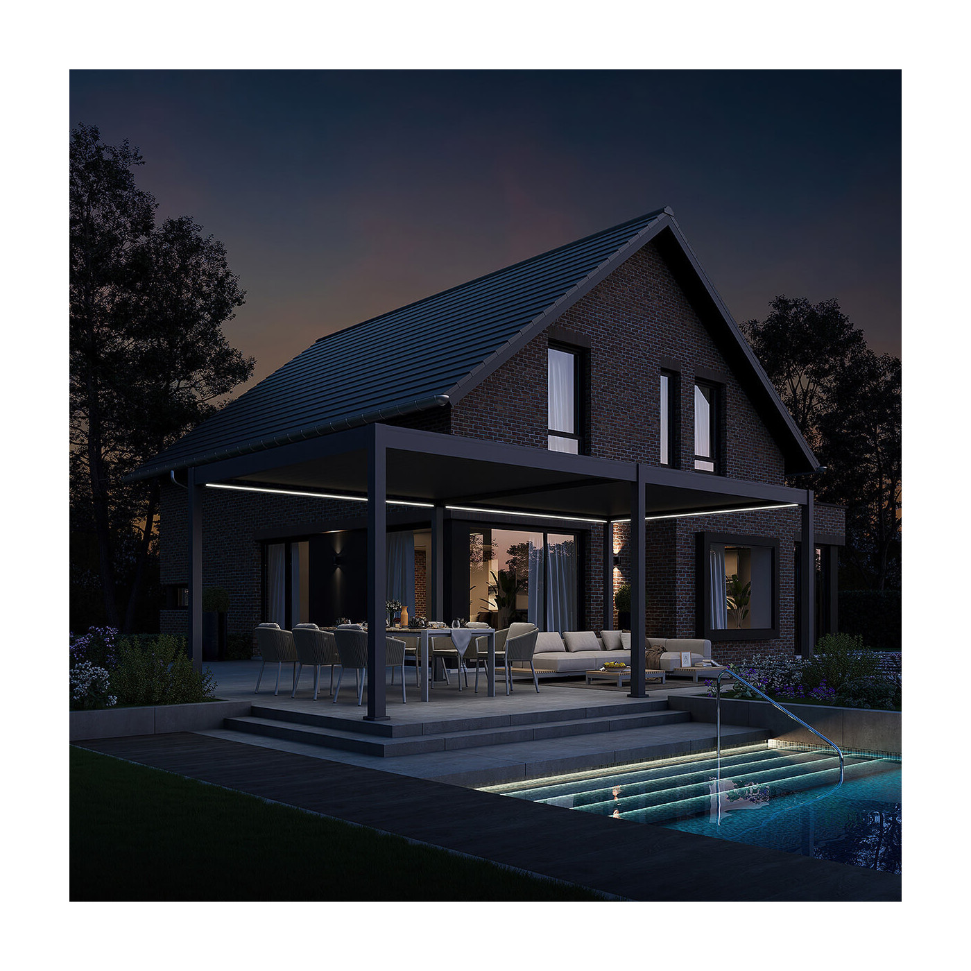 Pergola tarasowa Deluxe Automatic+LED 3.6x7.2 antracytowa w wieczornej aranżacji przed domem z basenem.