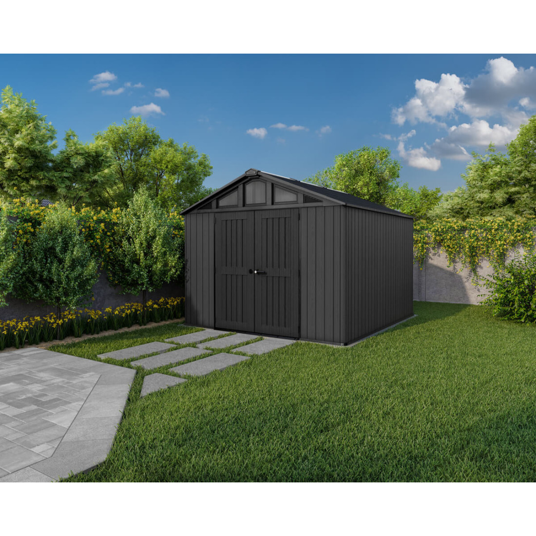 Szary domek narzędziowy na trawie w otoczeniu żółtych kwiatów i zielonych krzewów oraz drzew